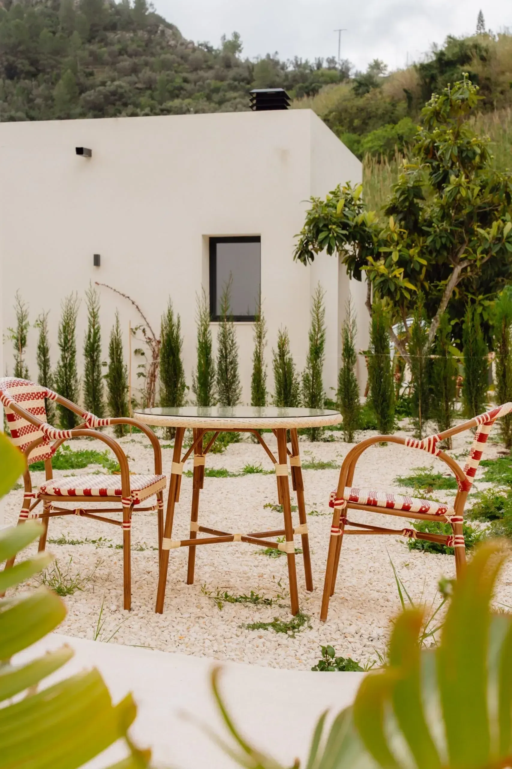 A table and chairs on a villa terrace at Denia