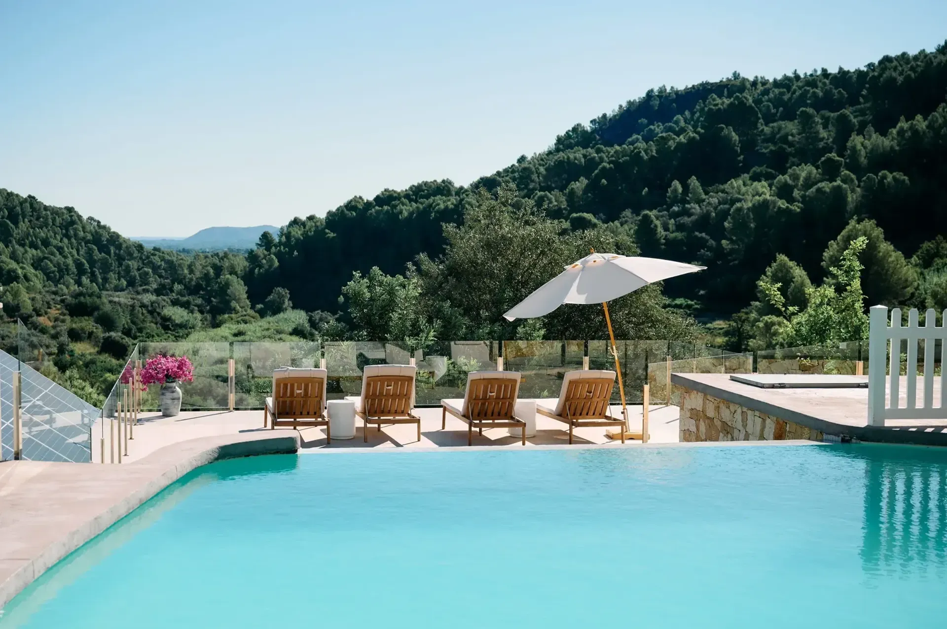 The pool of YOUNG Hotels Denia looking out over the valley