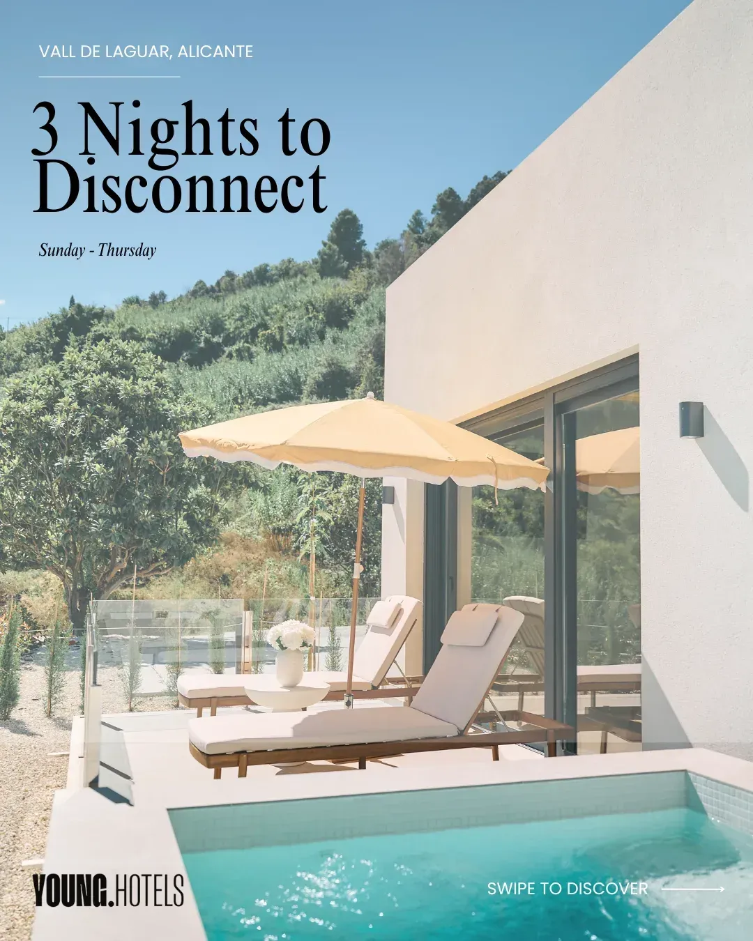 Sun loungers beside the pool of a villa at YOUNG Hotels Denia